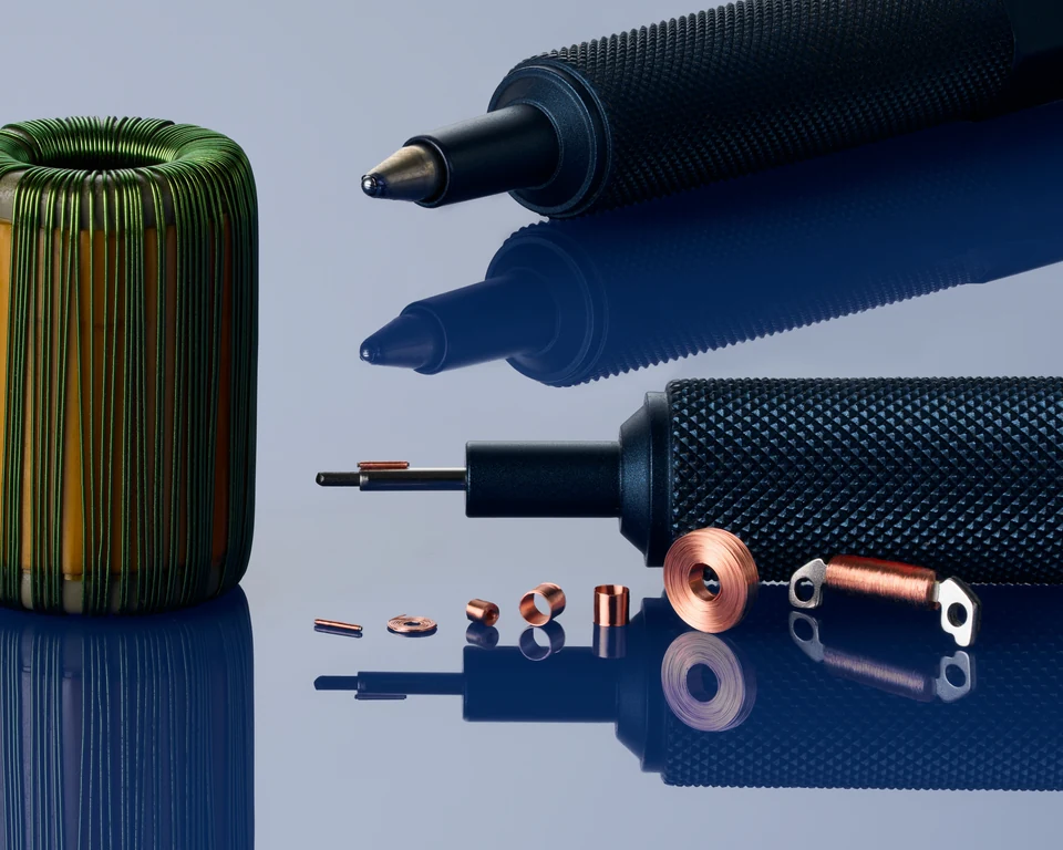 MNT microcoils and miniature components beside pen tips